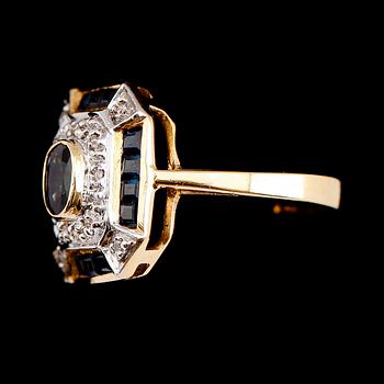 RING, 18 k guld, briljanter och safirer.