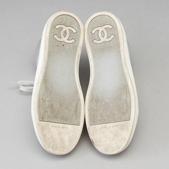 Sneakers by Chanel.