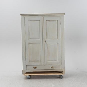 A painted clothing cabinet, late 19th century.