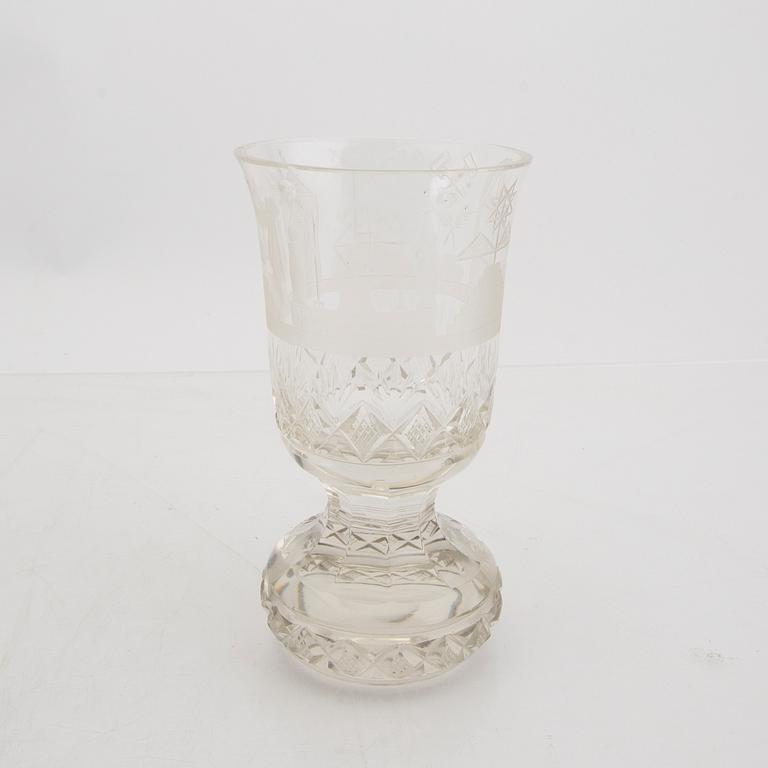 A decanter with silver fitting and a free mason late 19th century glass.