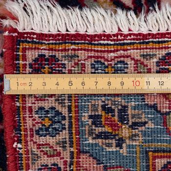 A Keshan carpet, c. 403 x 290 cm.