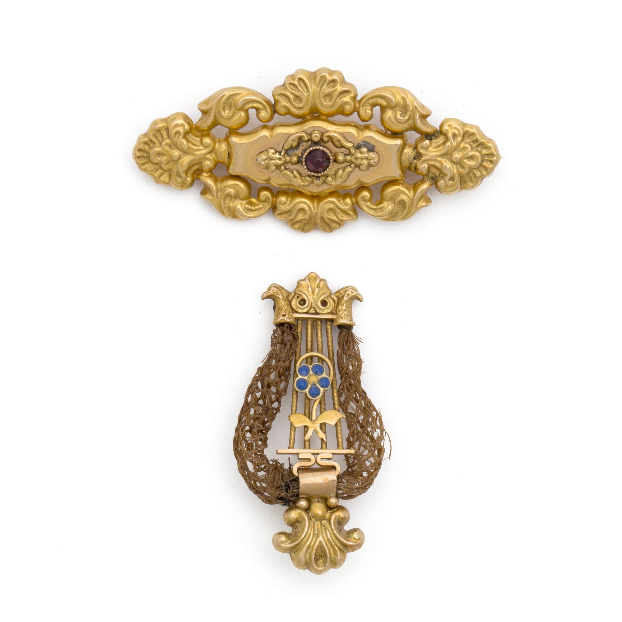 Two 1840s 18K gold brooches.