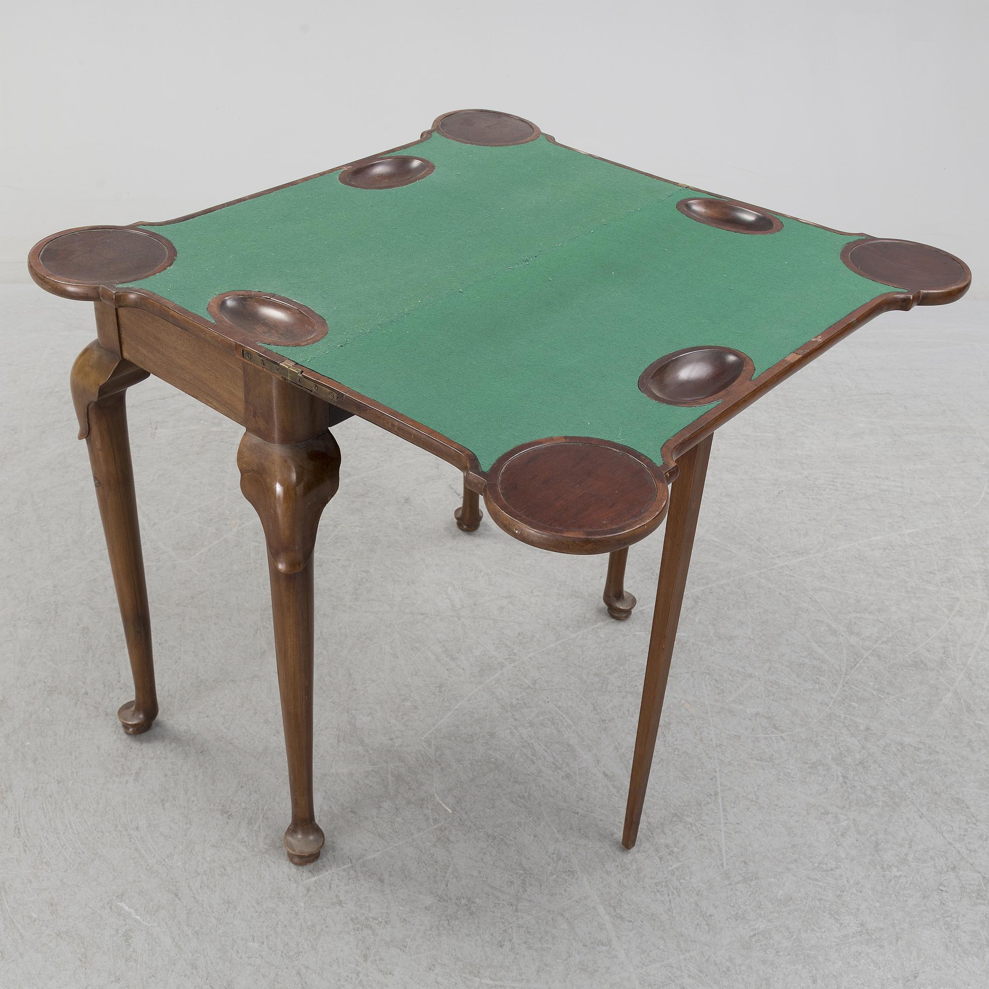 A mahogany games table, 18th Century.