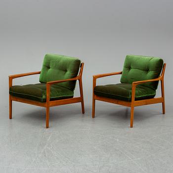 A pair of 'USA 75' easy chairs by Folke Ohlsson, Dux.