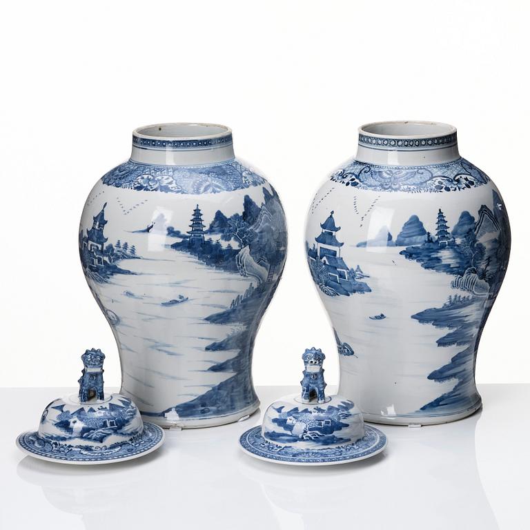 A matched pair of blue and white Chinese jars with covers, Qing dynasty, Qianlong (1736-95).