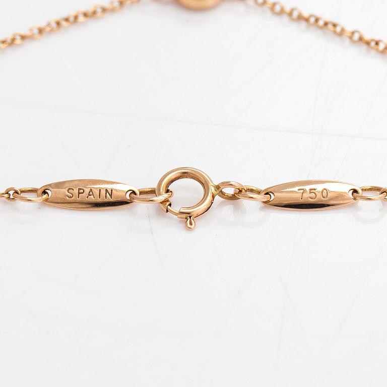 Tiffany & Co, Elsa Peretti, an 18K gold bracelet with a brilliant cut diamond ca 0.07 ct.