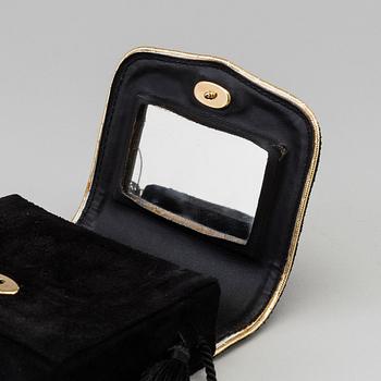 YVES SAINT LAURENT, a suede evening bag.