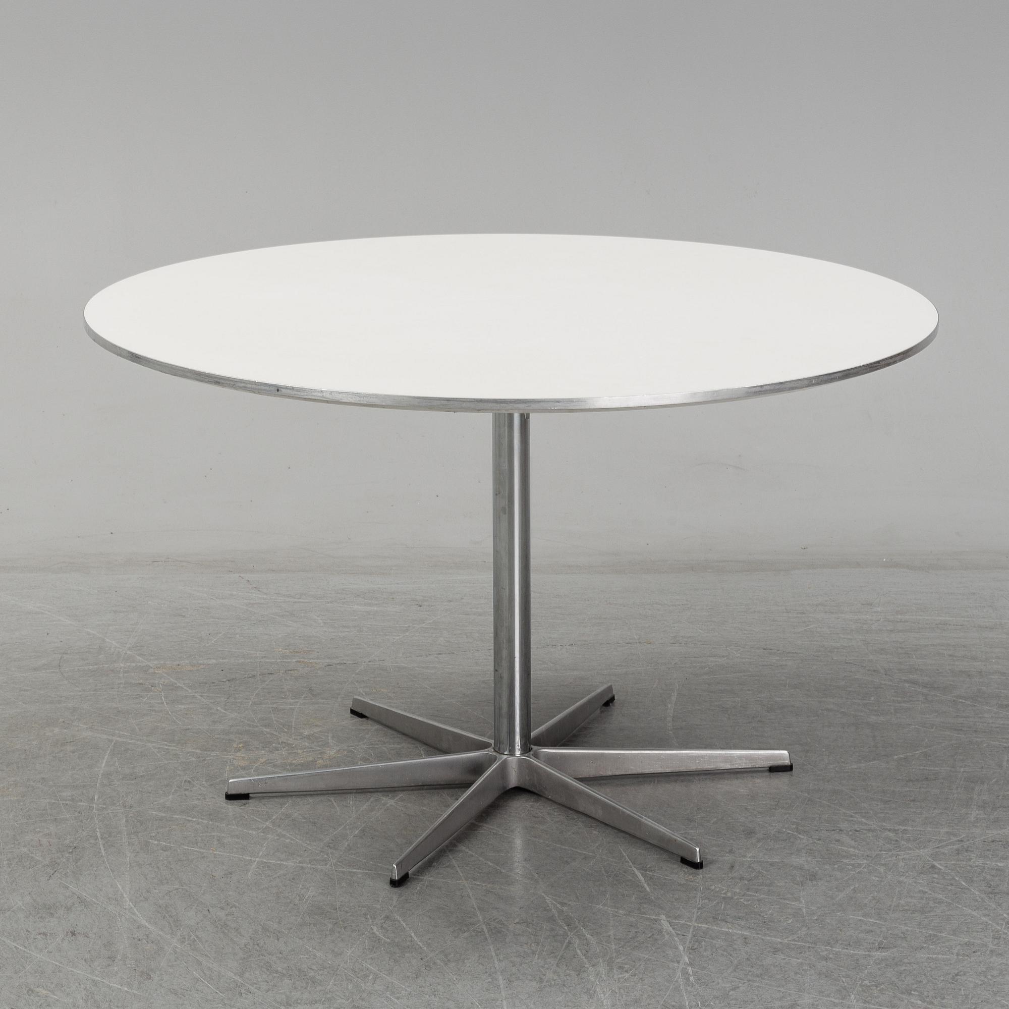 ARNE JACOBSEN, a table from Friz Hansen, Denmark, 2002.