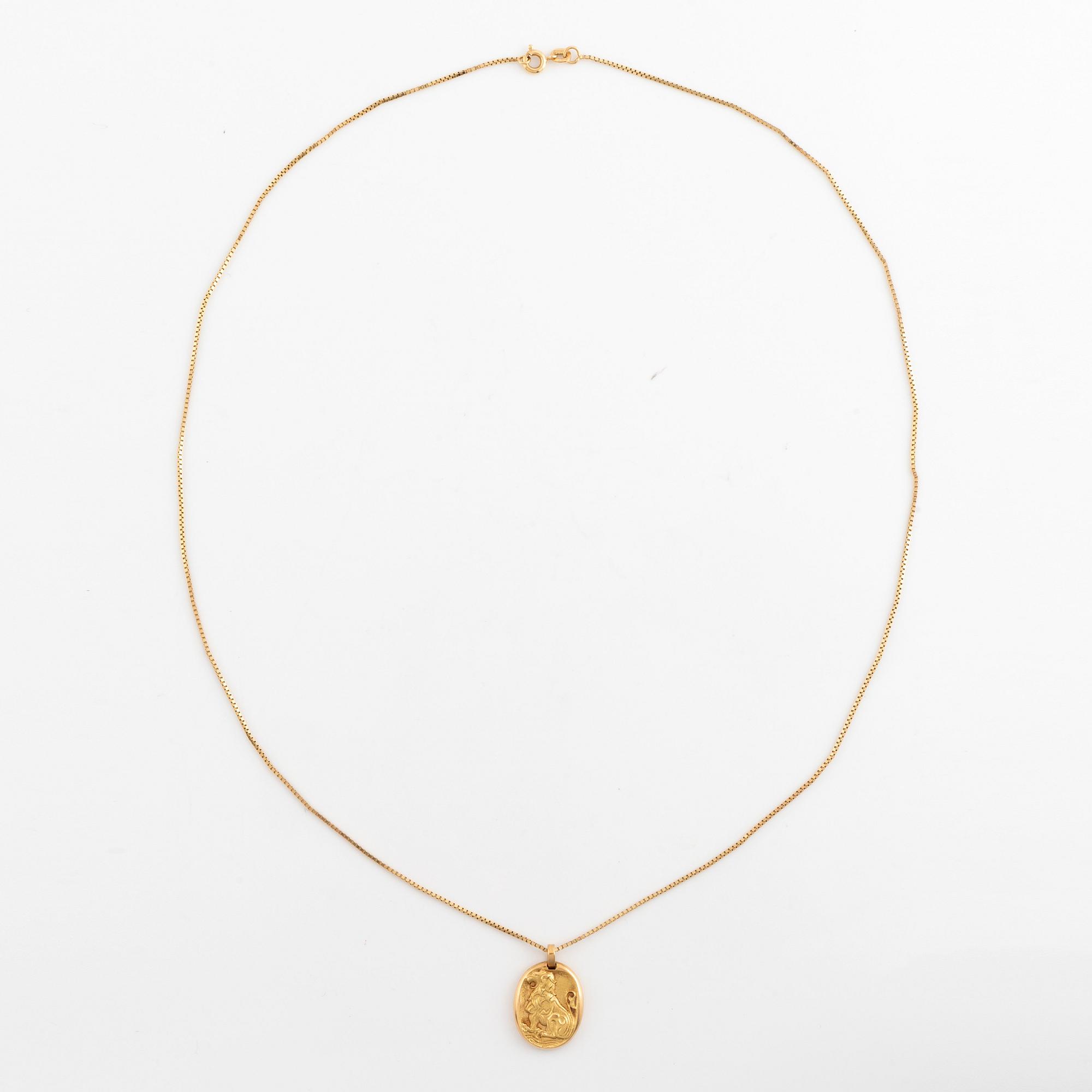 A Cartier Leo zodiac pendant.