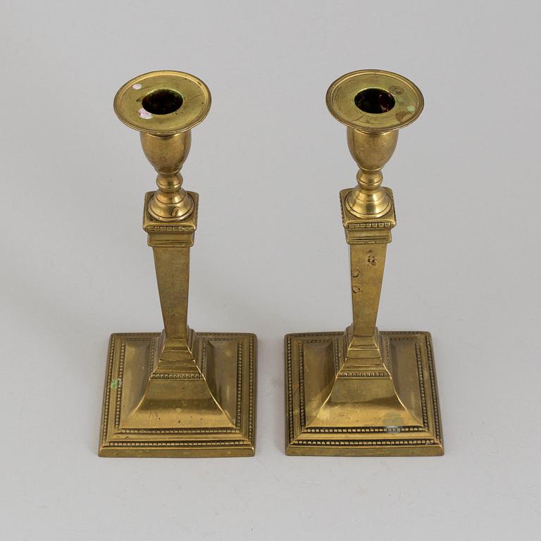 A PAIR OF GUSTAVIAN BRONZE CANDLSTICKS, late 18th century.