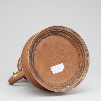 An 18th century copper tankard, presumably German.