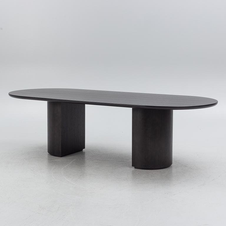Space Copenhagen, a 'Moon' dining table, Gubi, Denmark.