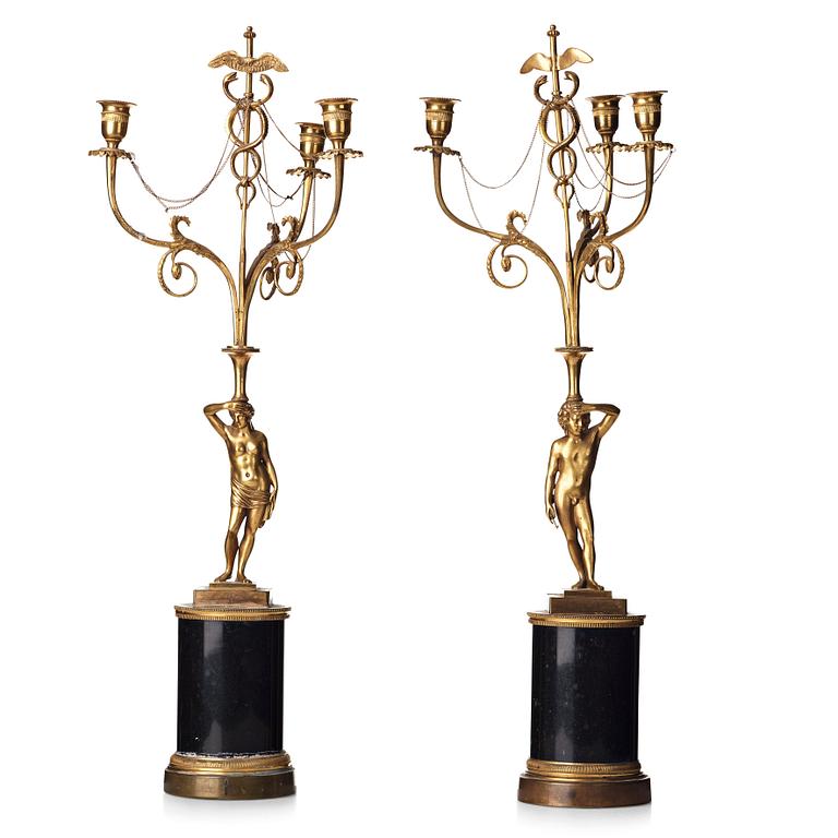 A pair of late Gustavian three-light chandeliers, circa 1800.