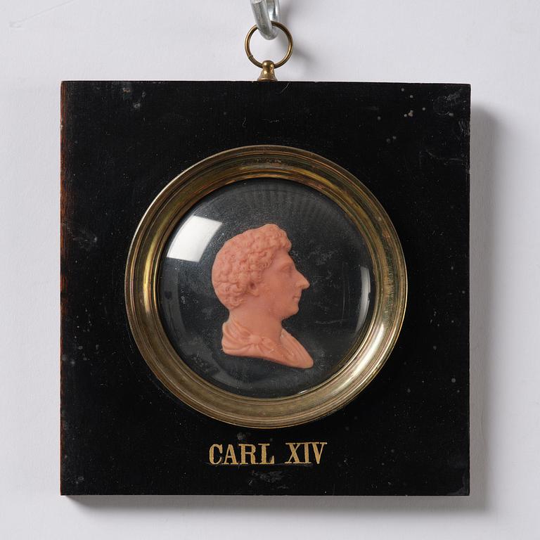 A set of twenty wax portraits of Swedish monarchs, late 19th century.