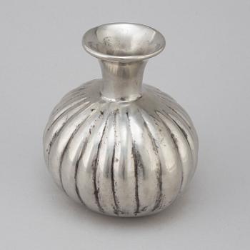 A pewter vase from Firma Svenskt Tenn 1974.