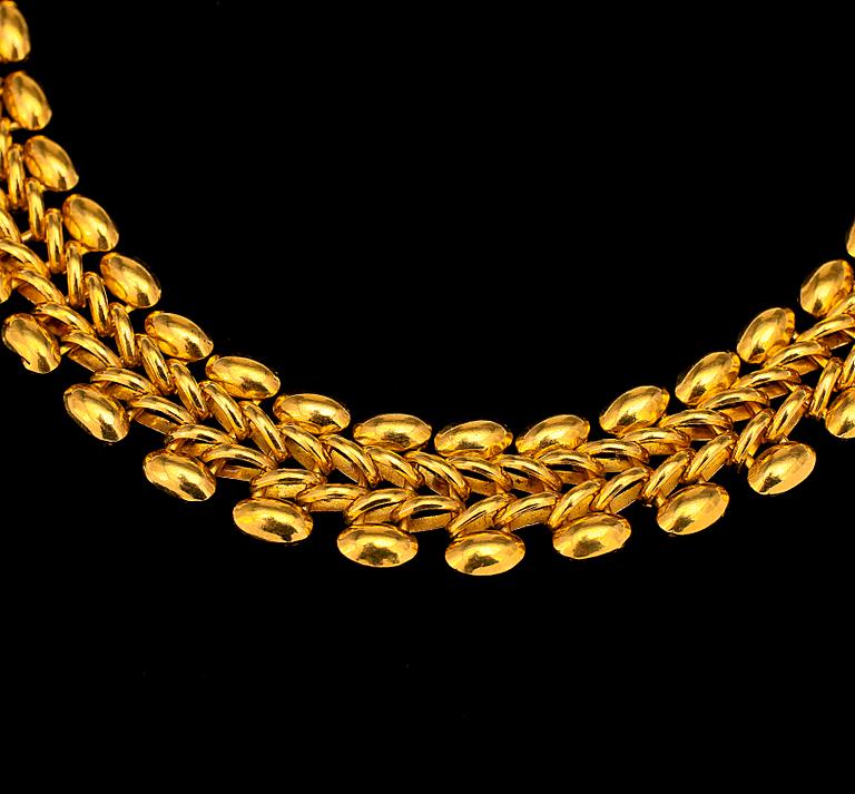 COLLIER, guld 22k. Vikt ca 86 g.