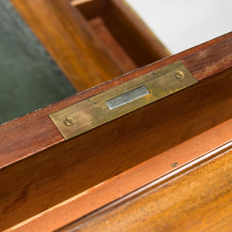 A 20th-century Louis XVI style mahogany veneered writing desk.