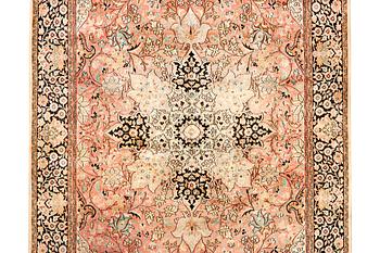 A silk Kashmar carpet, c. 280 x 177 cm.