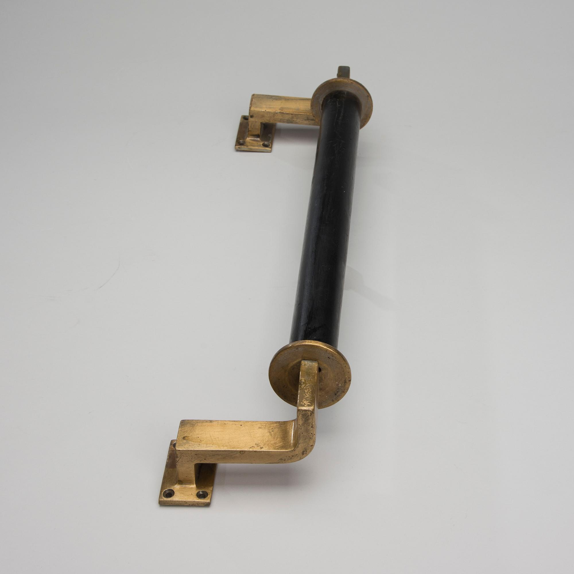 DÖRRHANDTAG, 1900-talets mitt.