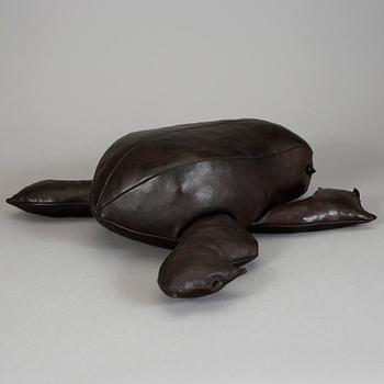 Groda. Brunt läder.