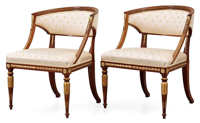 A Swedish late Gustavian-style seating circa 1900 (comprising four chairs, two armchairs, one sofa) and an Empire table.