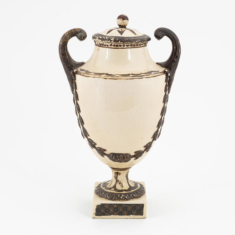 A creamware lidded urn, Late Gustavian, around 1800.