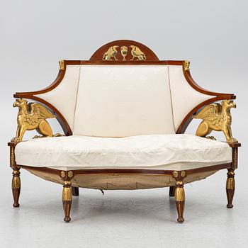 An Empire-style sofa, around 1900.