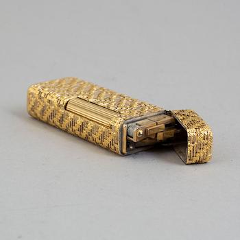 A Dunhill gold plated lighter.