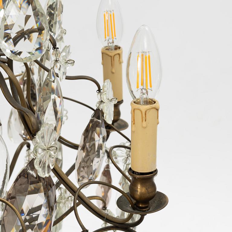 Takkrona, rokokostil, 1900-talets första hälft.