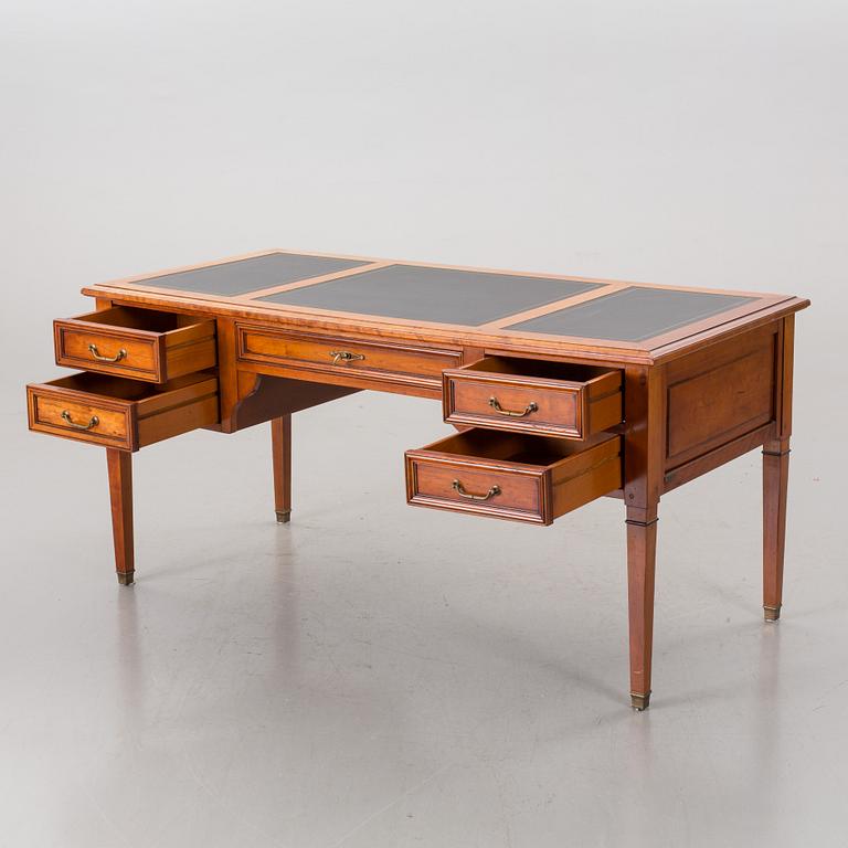 A FRANCE WRITING DESK AND A CHAIR FROM GRANGE.