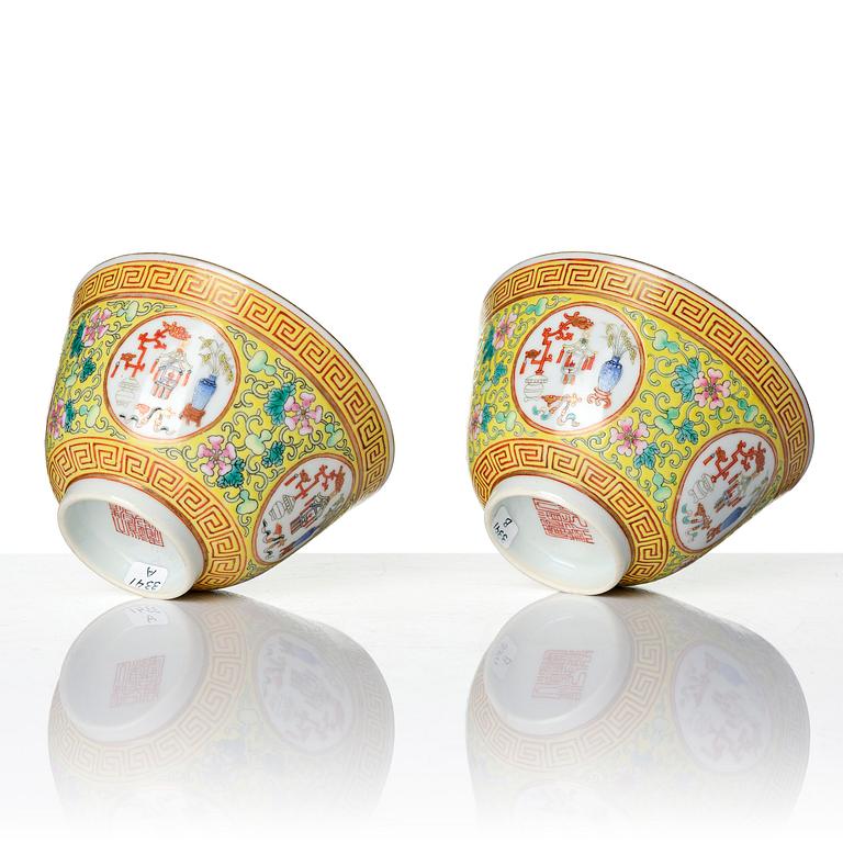 A pair of yellow ground 'medallion' bowls with covers, Qing dynasty with Daoguang mark.