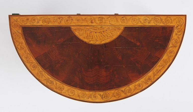 A Russian Louis XVI mahogany and birch parquetry demi-lune games table, late 18th century.