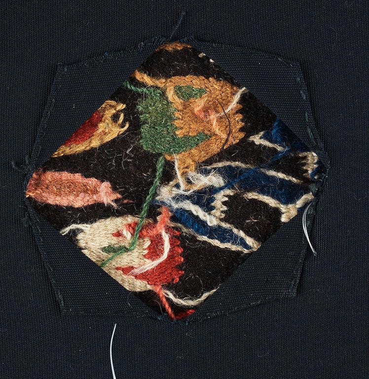 A CARRIAGE CUSHION FRAGMENT, tapestry weave, "Den innelykta fågeln", ca 52 x 67 cm, Scania (Sweden).