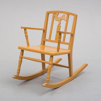 Carl Hörvik, A Carl Hörvik children's rocking chair, Nordiska Kompaniet, the model exhibited in Gothenburg 1923.