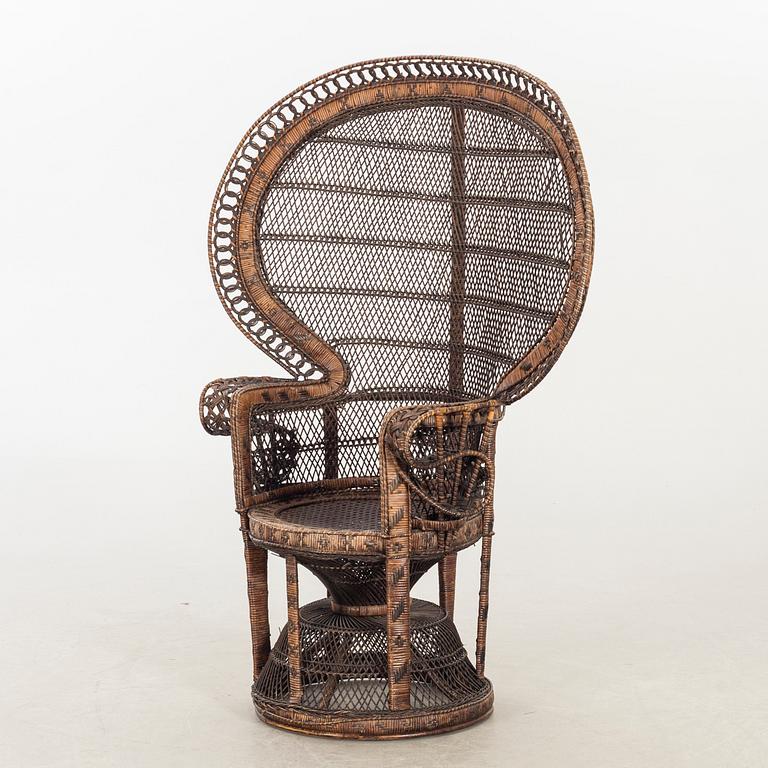 AN RATTAN EASY CHAIR.