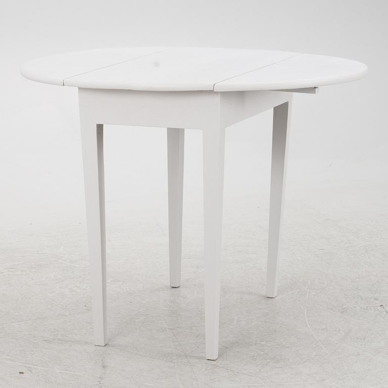 A drop-leaf table, late 19th Century.