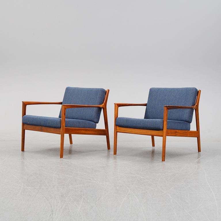 Folke Ohlsson, a pair of teak 'USA 75' easychairs, Dux, designed in 1963.