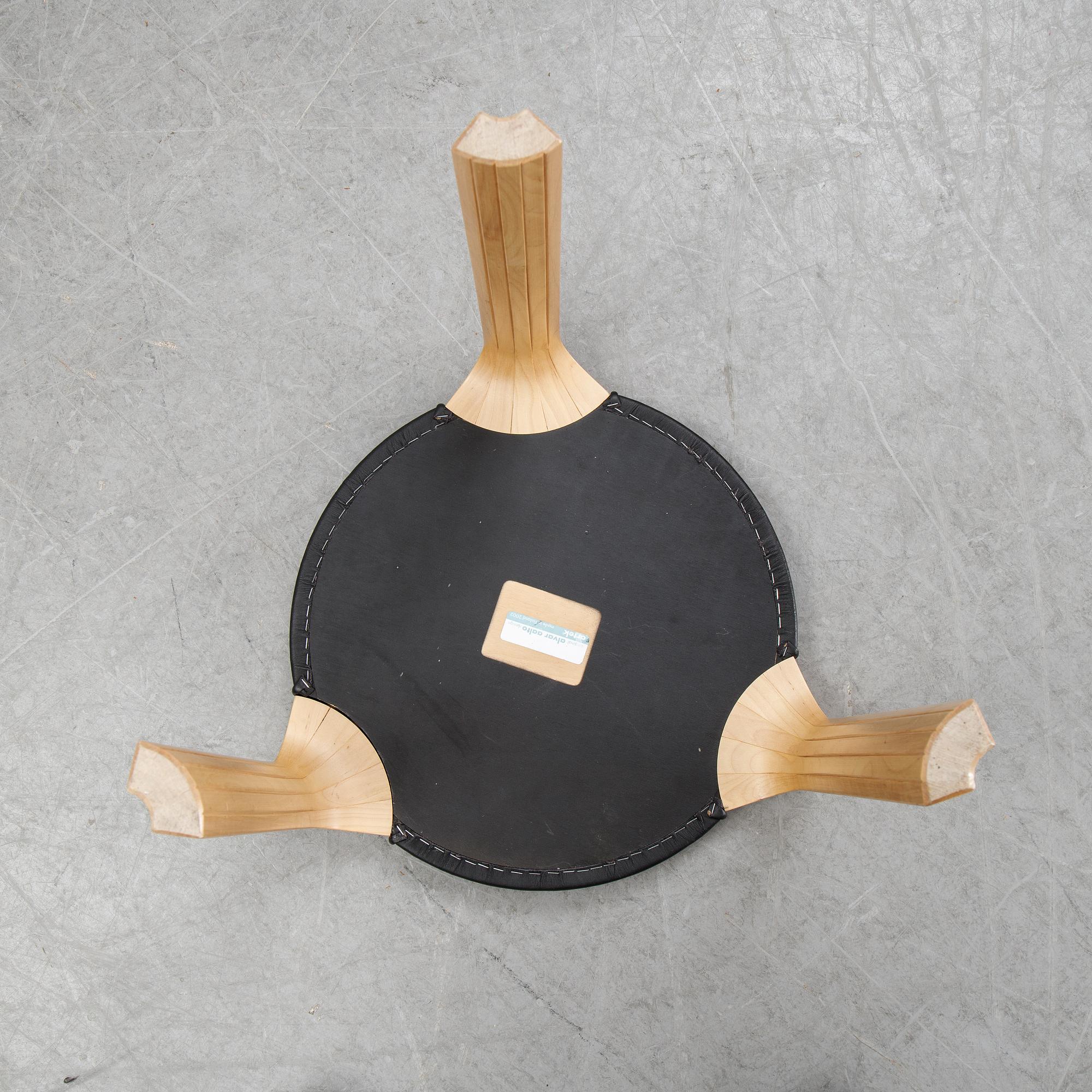 A model Y 601 stool by Alvar Aalto for Artek, dated 2002.