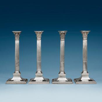 Two similar pairs of English candlesticks, marks of John Wakelin and William Taylor, London 1786 and 1787.