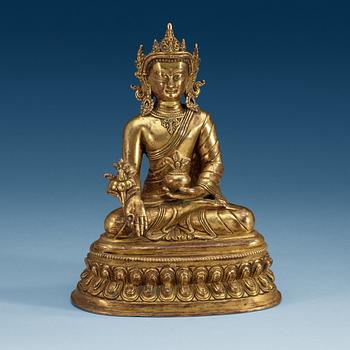 A seated gilt bronze figure of Amitayus, presumably late Qing dynasty/20th Century.