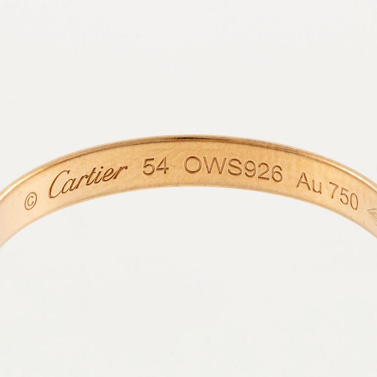A Cartier "Trinity" ring 18K gold in three colours.