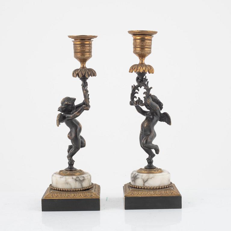 A pair of candlesticks, mid 19th Century.