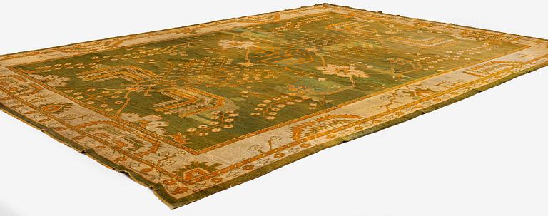 An antique Ushak carpet, Western Anatolia, c. 502 x 359 cm.