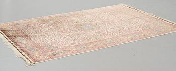 A carpet, an old silk Turkey, ca 237,5 x 146,5  cm (as well as 3,5-4 cm flat weave at the ends).