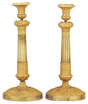 A pair of French Empire early 19th Century candlesticks.