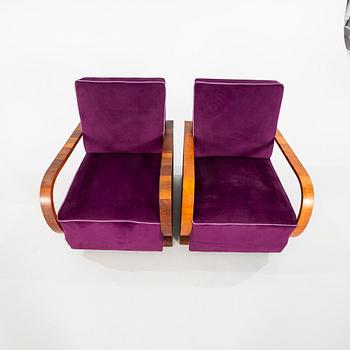 A pair of Art Deco easy chairs from the first half of the 20th century.