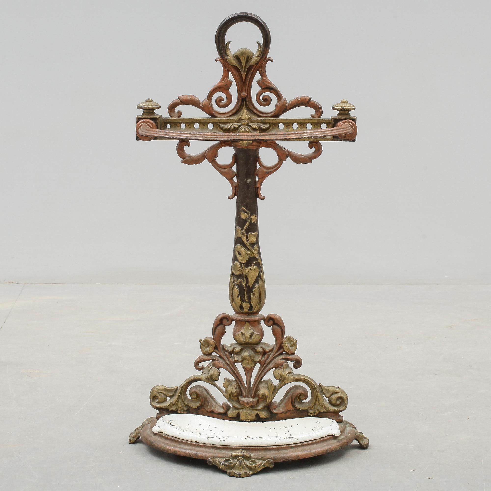 PARAPLYSTÄLL, gjutjärn, möjligen Bolinders, omkring sekelskiftet 1900.