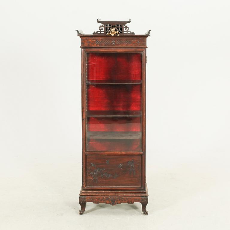 A Chinese style dark wood display cabinet first half of the 20th century.