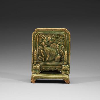 184. A celadon table screen shaped brush stand, Ming dynasty (1368-1644).