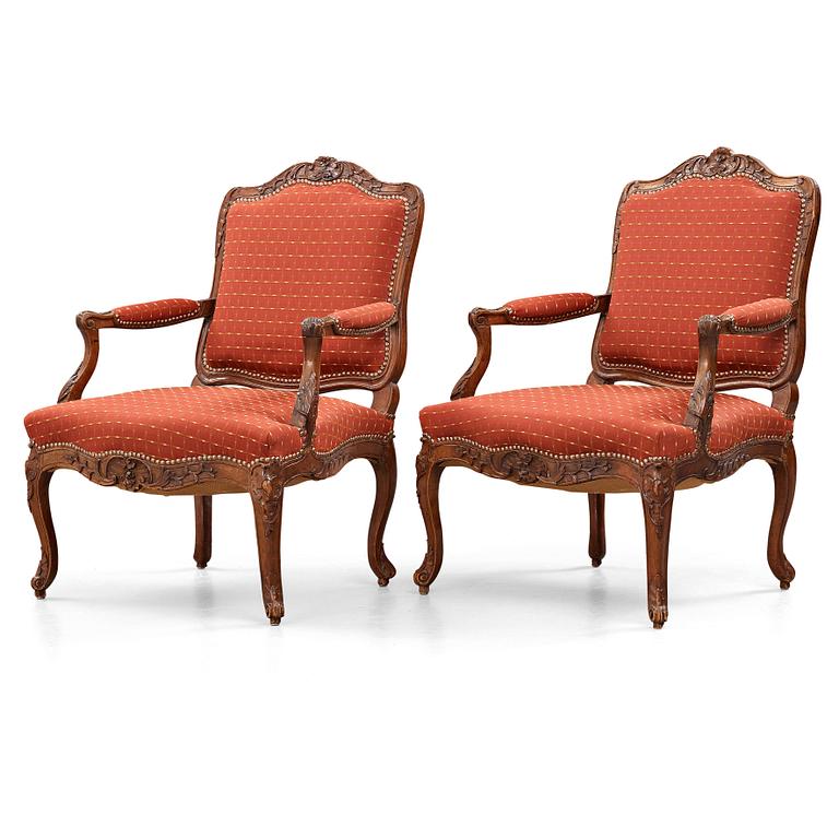 A pair of Louis XV 18th century armchairs.